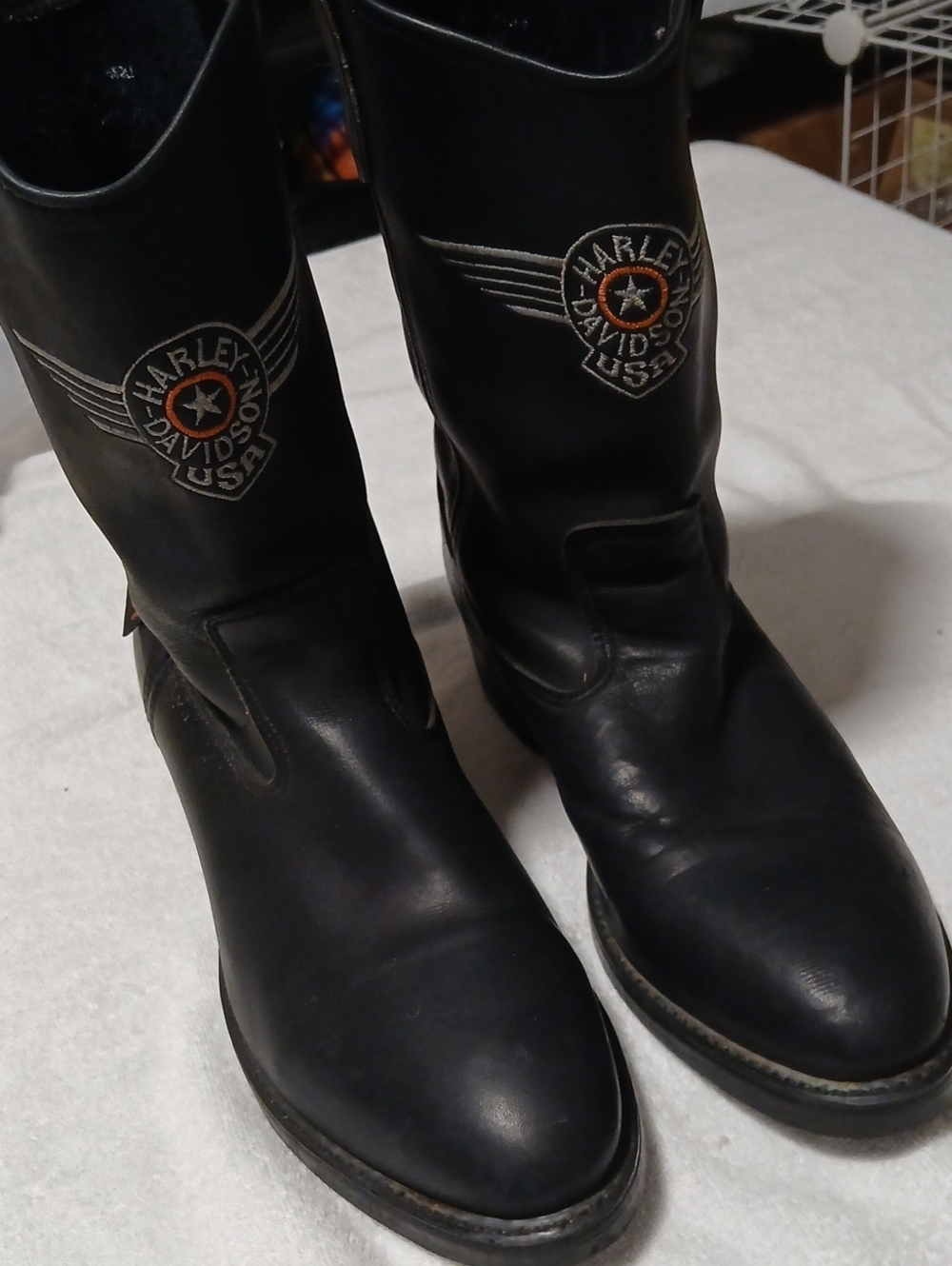 Harley-Davidson Black Leather Cowboy Boots with Winged Logo and Orange Accent